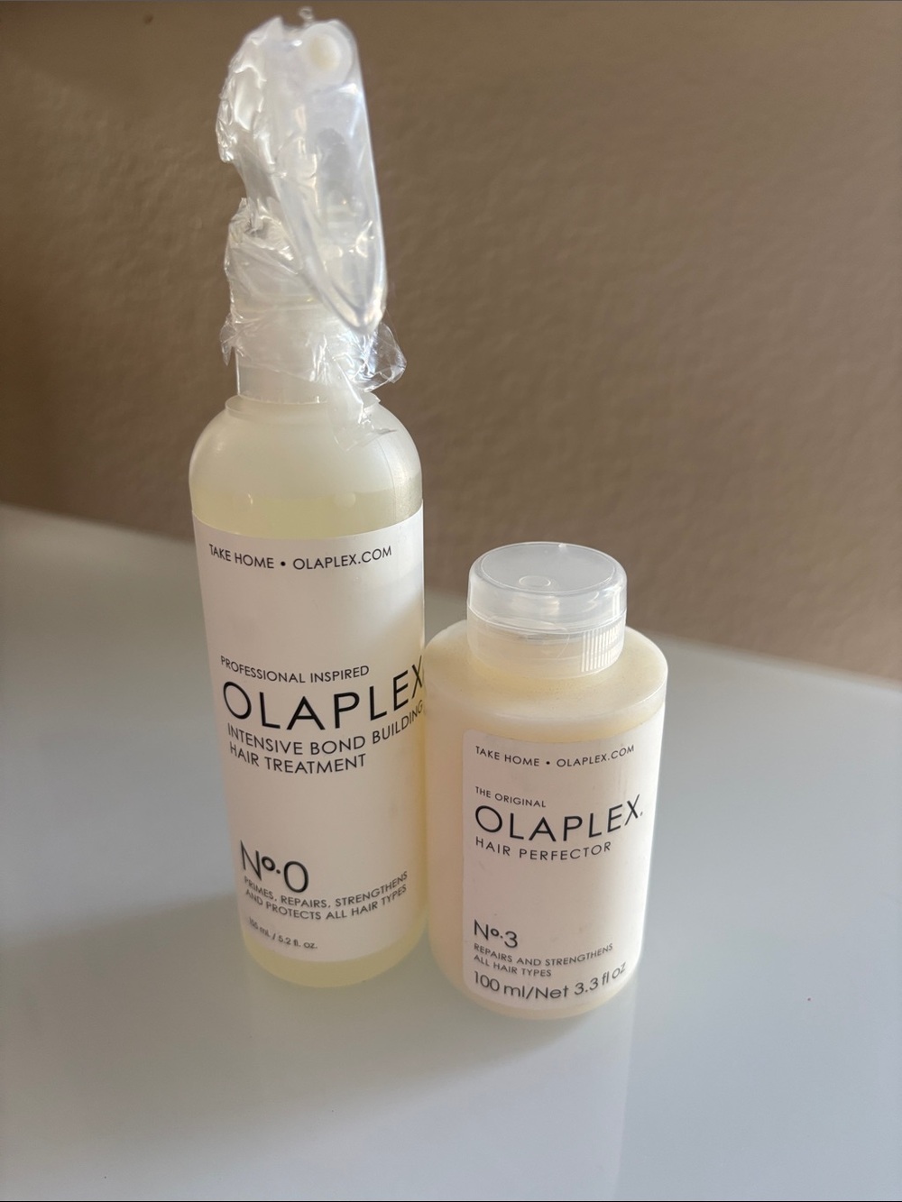 OLAPLEX No.0 Intensive Bond Builder & No.3 Hair Perfector - White/Cream Bottles